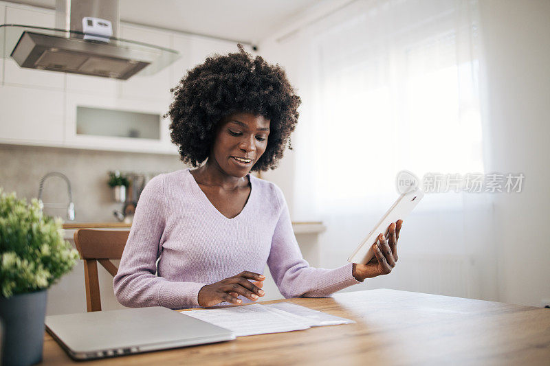 Young businesswoman working from home